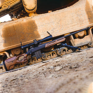 Rifle equipped with Cobra Stock Walnut in use #2