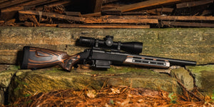 Rifle equipped with Merica Stock Tiger Wood in use #2