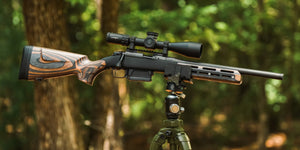 Rifle equipped with Merica Stock Tiger Wood in use #1