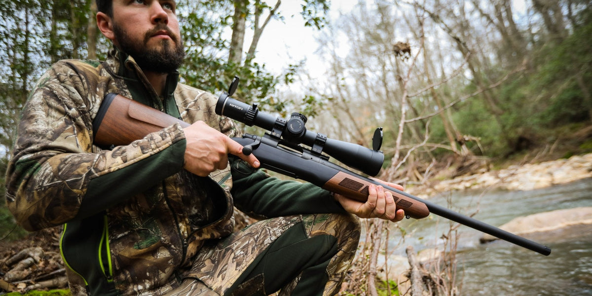 Rifle equipped with Wild Man Stock Walnut in use #1
